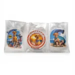 Three custom pet stickers of a yellow Labrador in beach scenes, packaged in clear poly bags. Windy City Tailz custom pet sticker order photo.