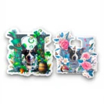 Corgi custom pet stickers with St. Patrick's Day and spring floral designs side by side. Windy City Tailz sticker photo.