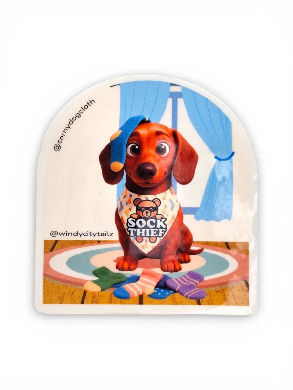 Dachshund digital character sticker with sock thief bandana design surrounded by socks. Windy City Tailz sticker photo.